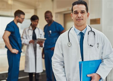 Confident Young Hispanic Doctor Stock Photo 136037 Youworkforthem