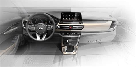 Kia teases compact SUV’s sleek interior - CNET