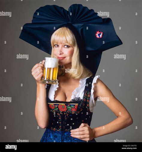 Woman With Alsatian Traditional Folk Costume Holding A Beer Alsace