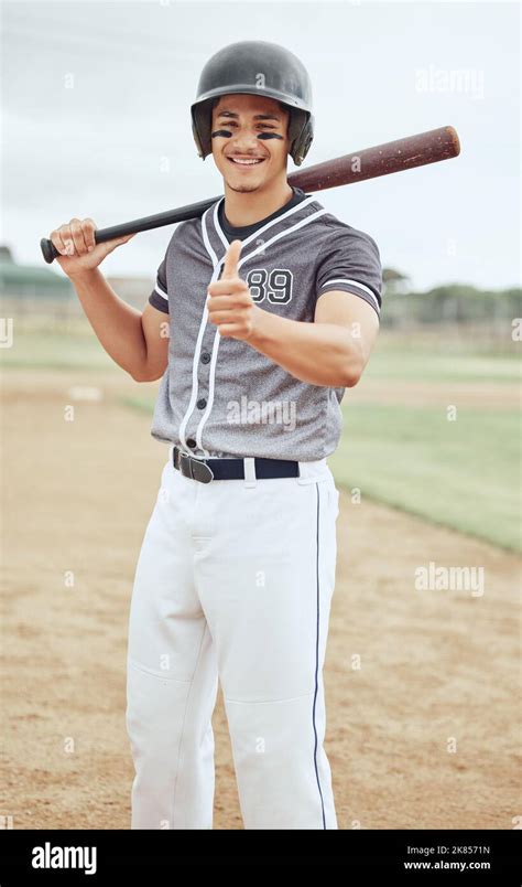 Baseball Player Thumbs Up And Success For Sports Game On Stadium Pitch