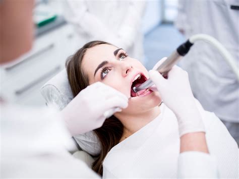 8 Ways to Make Cleanings Easier if You Have a Fear of the Dentist | SELF