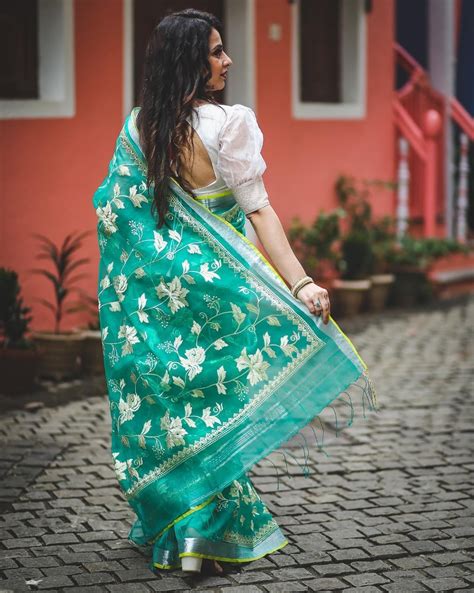 Elegant Aqua Blue Floral Embroidery Pure Resham Muslin Silk Saree