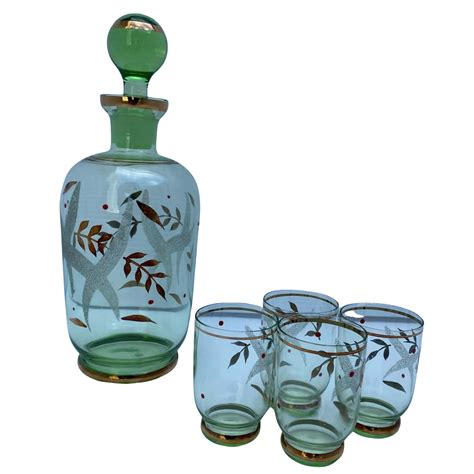 Green Glass Decanter With Gold Rim And Matching Glasses