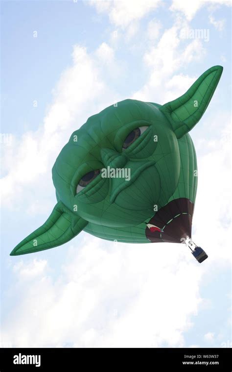 Hot Air Balloon Resembling Yoda From Star Wars Rising In The Air Stock Photo Alamy