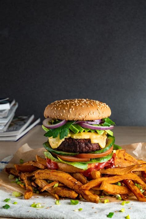 Homemade Plant Based Burger With Sweet Potato Fries Around Vegan