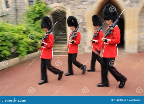 Windsor Castle Guards in Action in Windsor Castle in England. Editorial ...