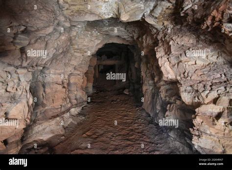 An abandoned mine tunnel passage Stock Photo - Alamy