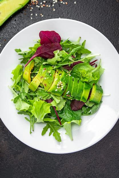 Premium Photo Avocado Salad Fresh Leaf Mix Lettuce Spinach Arugula