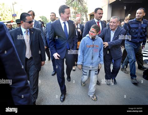 Prime Minister David Cameron Meets Mohammed During A Walk Through