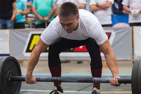 Professional Athletes Performing Strength Exercises — Stock Photo