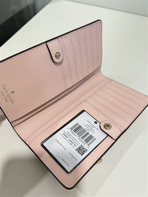 Kate Spade Madison Large Slim Bifold Wallet In Conch Pink Exclusively Usa