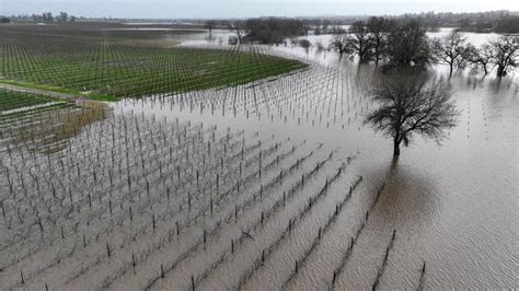 Dramatic images show devastation from onslaught of atmospheric rivers ...