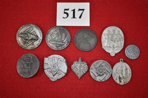 Sold at Auction: German WWII Nazi Badges and Pins