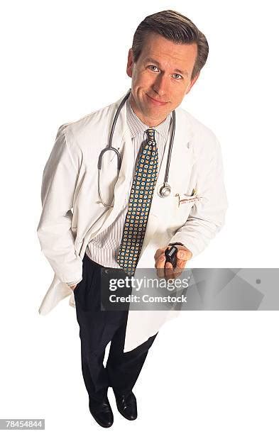 1549 Portrait Of Male Doctor Wearing White Coat Stock Photos High Res