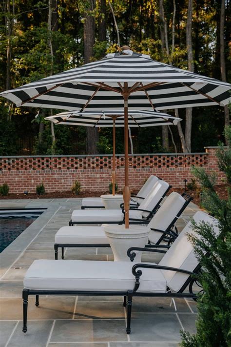 The Pool Furniture in Our Backyard Vacation Oasis | Backyard pool, Pool landscaping, Pool patio ...