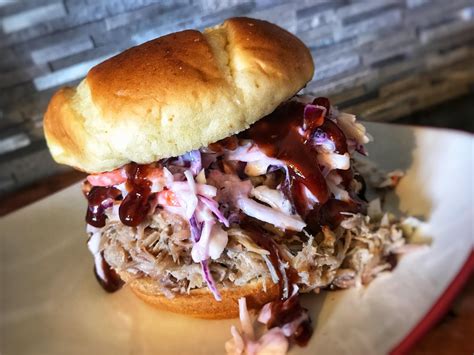 [homemade] Pulled Pork Topped With Slaw And Bbq On A Brioche Bun R Food