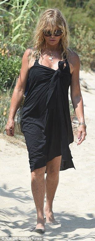 Goldie Hawn Strolls On Beach In St Tropez With Black Bathing Suit And