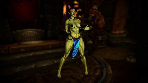 Muscular Feral Orc Queen In Bikini Armor Dancing And Flexing Her Biceps
