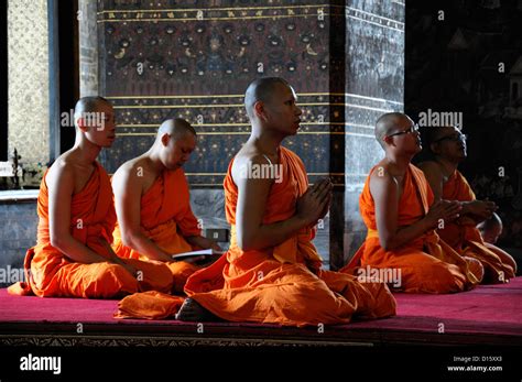 Orange Robed Monks Pray Praying Chant Chanting Wat Pho Temple Of The