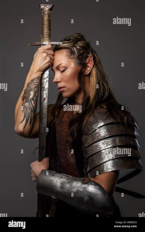 Elf Woman Holding Sword Stock Photo Alamy