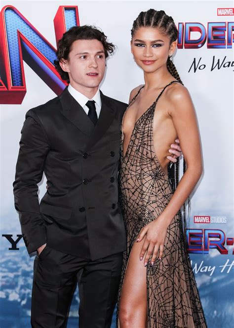 Zendaya Tom Holland Attend Usher Concert In Rare Date Night Us Weekly