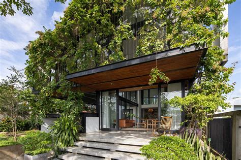 A Glass Stacked House In Vietnam Shrouded In Greenery