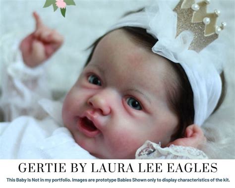 A Baby Wearing A Tiara And Pointing At The Camera