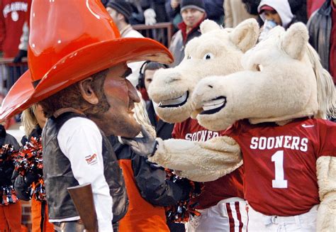 Oklahoma University Sooners Boomer And Sooner Picking A Fight With The Oklahoma State Mascot