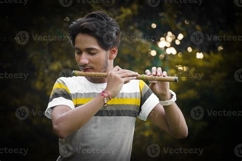 man playing flute image hd 6784709 Stock Photo at Vecteezy