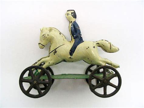 Horse and Rider on Platform with Wheels Toy - Antique Toys Library