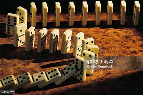 Dominos Falling Photos And Premium High Res Pictures Getty Images