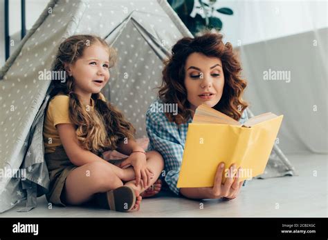 Babysitter Reading Kids Hi Res Stock Photography And Images Alamy