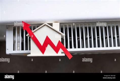 Cost Of Living Crisis Red Increasing Arrow On A Radiator Rising Cost Of Energy And Bills Stock