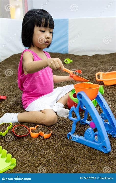 Asian Chinese Little Girl Playing With Sand Stock Photo Image Of