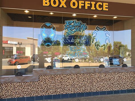 My local movie theater has started painting its box office window to