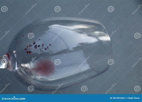 Wine Diamonds Or Tartrate Crystals At The Bottom Of An Empty Glass Of Red Wine Stock Image