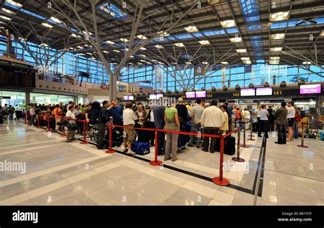 Passengers Waiting In Queues At Check In Counters Stuttgart Airport