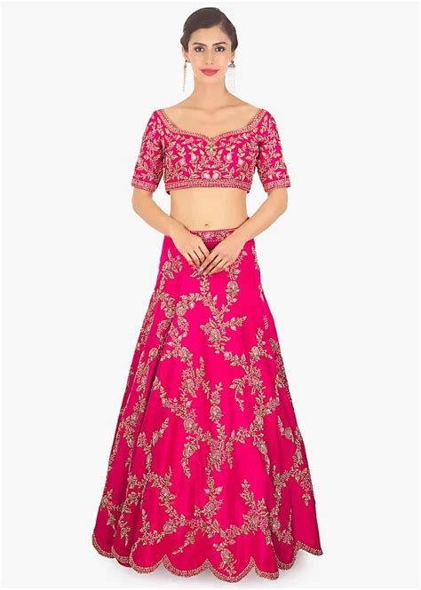 Fuschia Pink Lehenga Choli In Raw Silk Paired With Matching Net Dupatta