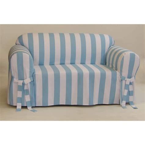 A Blue And White Striped Couch Sitting On Top Of A Floor