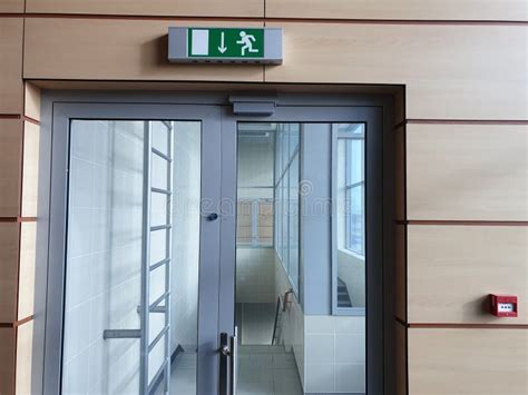 Emergency Exit With Glass Door In Airport Office Building Emergency