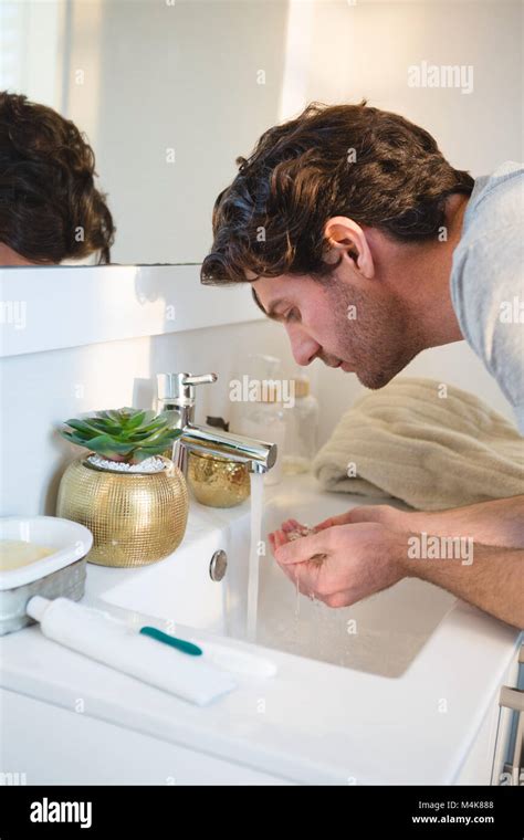 Man Washing In Bathroom Hi Res Stock Photography And Images Alamy