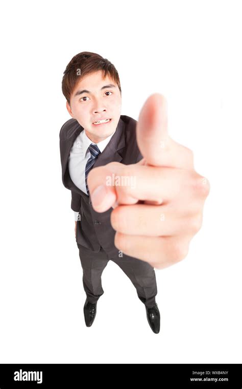 Angry businessman pointing to camera Stock Photo - Alamy