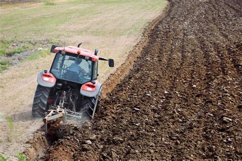 Tractor Plowing The Field Stock Photo Ilfede 12073577