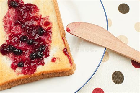 Toast and Jam for Breakfast Stock Photo - Image of knife, blueberry ...