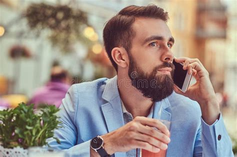 Close Up Portrait Of A Fashionable Bearded Businessman With A Stylish