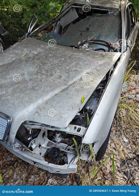 Unrecognizable and Wrecked Cars Beyond Repair Left at the Isolated Junk Yard. Stock Image ...