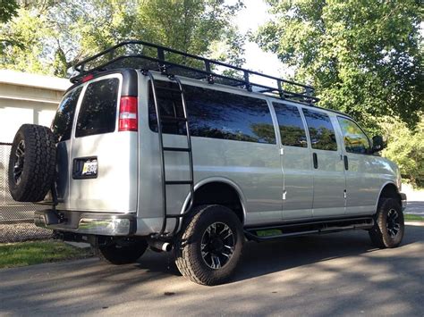 Chevy Gmc Van With Aluminess Tire Rack Roof Rack And Ladder Photo