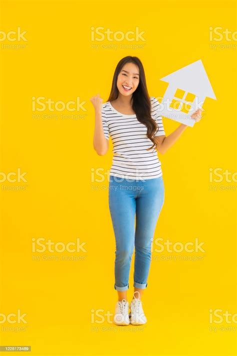 Portrait Beautiful Young Asian Woman Show Home Sign Stock Photo