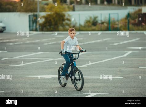 Bmx biking stunts in the summer outdoors Stock Photo - Alamy