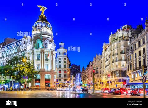 Madrid, Spain. Gran Via, main shopping street at twilight Stock Photo ...